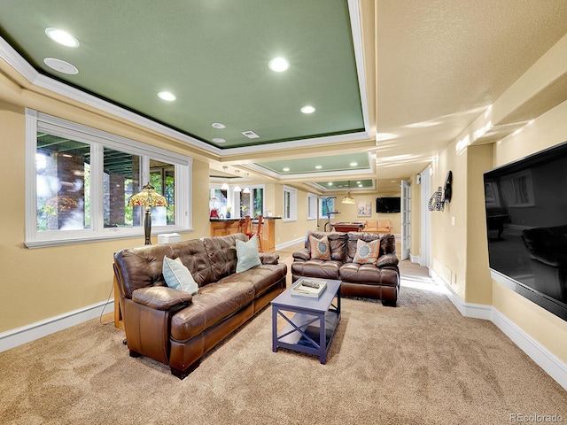 291 Fairchild Dr, Highlands Ranch, CO 80126 - living area featuring ornamental molding, carpet floors, a raised ceiling, recessed lighting, and baseboards