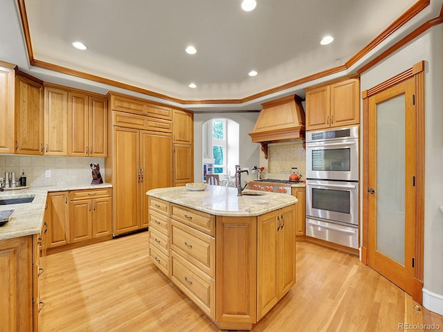 291 Fairchild Dr, Highlands Ranch, CO 80126 - kitchen featuring a warming drawer, custom exhaust hood, stainless steel double oven, light wood-type flooring, and crown molding