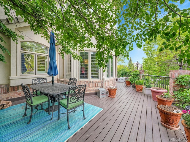 291 Fairchild Dr, Highlands Ranch, CO 80126 - wooden terrace with outdoor dining area
