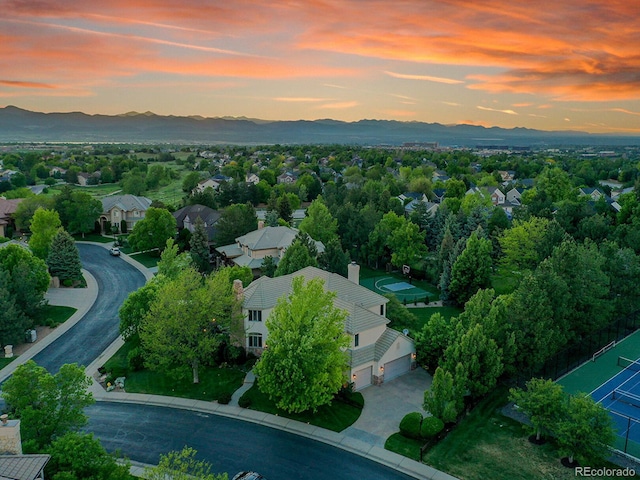 291 Fairchild Dr, Highlands Ranch, CO 80126 - aerial view at dusk of a mountain view