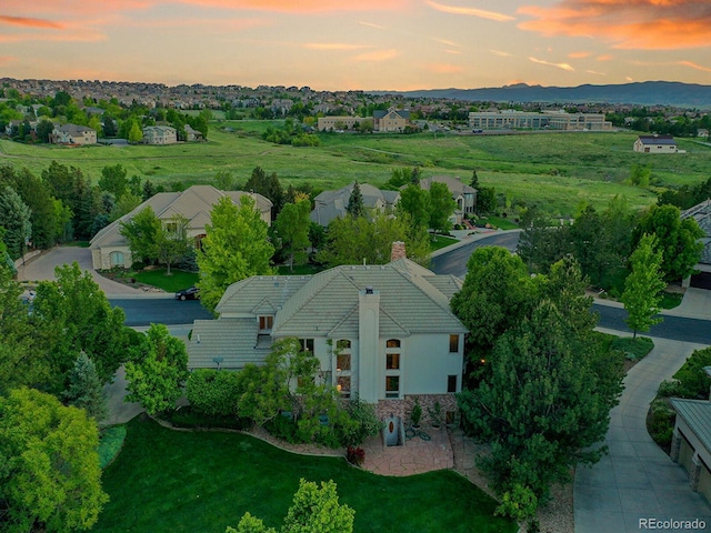 291 Fairchild Dr, Highlands Ranch, CO 80126 - aerial view at dusk of a mountain view