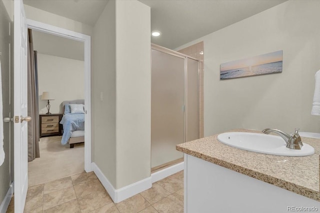 3762 White Rose Loop, Castle Rock, CO 80108 - bathroom with a stall shower, ensuite bath, vanity, tile patterned floors, and recessed lighting