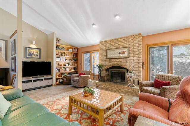 1045 Golden Hills Rd, Colorado Springs, CO 80919 - living room with a fireplace, built in shelves, and lofted ceiling