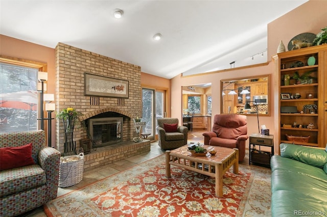 1045 Golden Hills Rd, Colorado Springs, CO 80919 - living area with vaulted ceiling and a fireplace