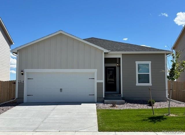 2214 Alyssa St, Fort Lupton, CO 80621 - ranch-style home with driveway, an attached garage, board and batten siding, and a shingled roof