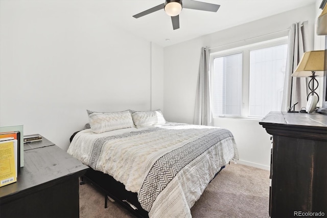 bedroom featuring ceiling fan and carpet floors