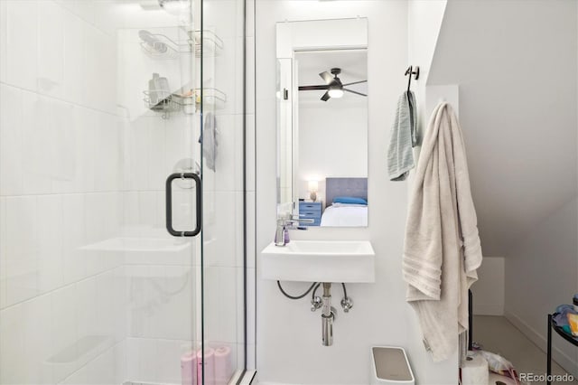 bathroom with ceiling fan, sink, and walk in shower