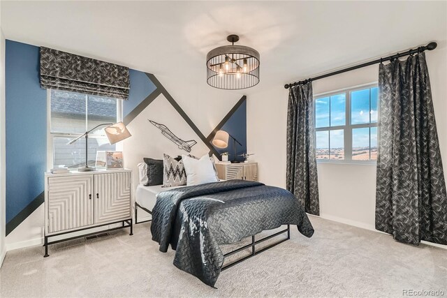 5572 Runge Ct, Timnath, CO 80547 - carpeted bedroom with baseboards and multiple windows