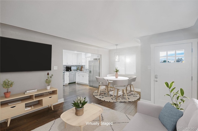 living room with dark wood-type flooring