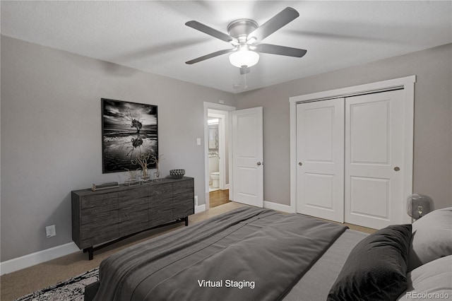 carpeted bedroom with a closet and ceiling fan