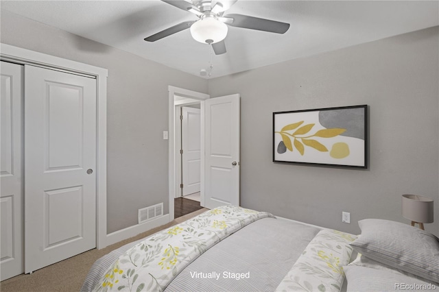 bedroom featuring carpet floors, ceiling fan, and a closet