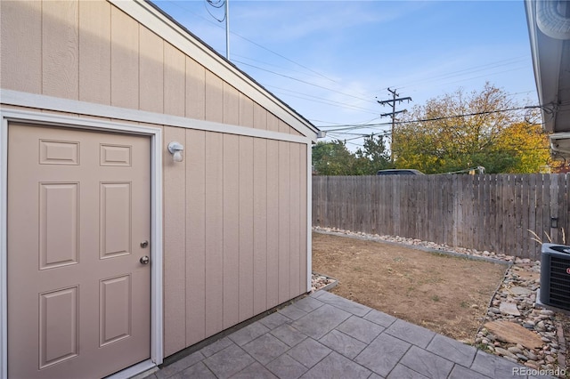 view of outbuilding with central air condition unit