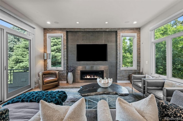 living room with hardwood / wood-style flooring and a wealth of natural light