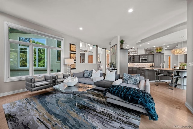 living room featuring light wood-type flooring