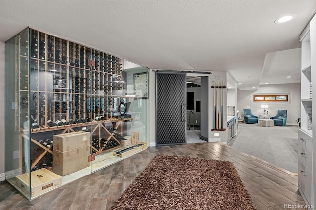 wine area with a textured ceiling