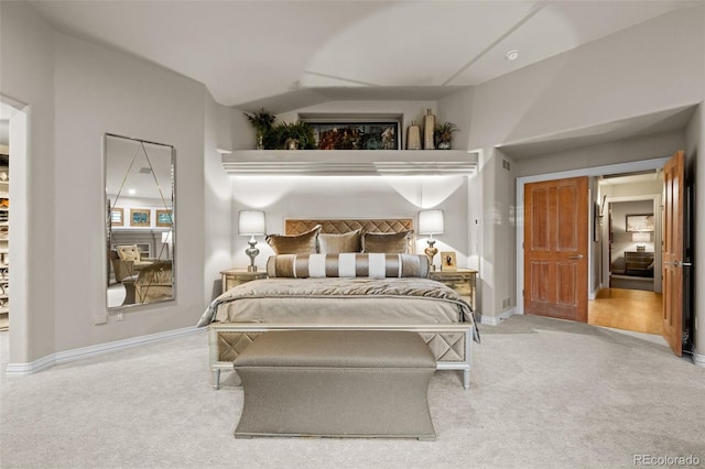 bedroom with light colored carpet