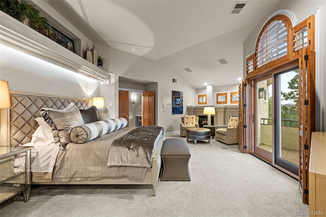 bedroom with access to outside, high vaulted ceiling, and carpet flooring