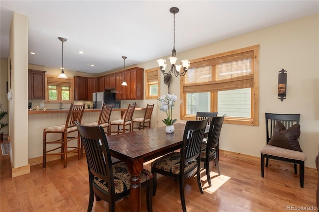 230 Buckhorn Cir, Granby, CO 80446 - dining area featuring a chandelier, light wood-style floors, recessed lighting, and baseboards