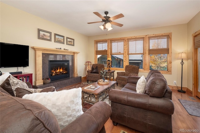 230 Buckhorn Cir, Granby, CO 80446 - living room with a fireplace, wood finished floors, ceiling fan, and baseboards