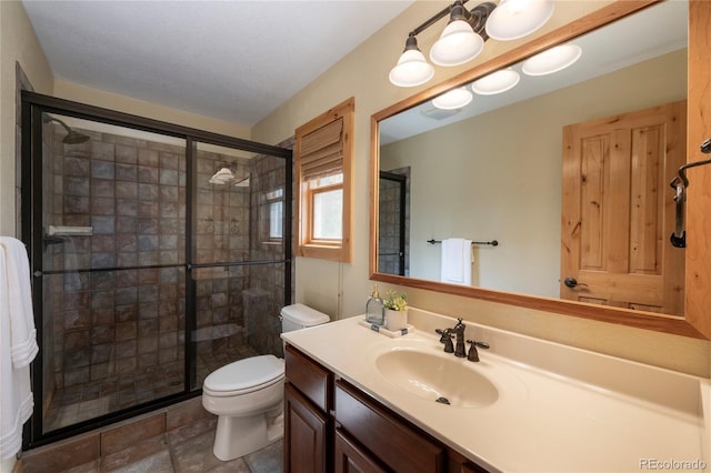 230 Buckhorn Cir, Granby, CO 80446 - full bath with a stall shower, toilet, and vanity