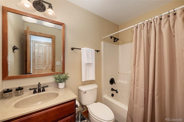 230 Buckhorn Cir, Granby, CO 80446 - full bathroom featuring vanity, toilet, and shower / tub combo with curtain