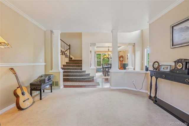 16071 Crestrock Cir, Parker, CO 80134 - carpeted foyer entrance featuring a chandelier, stairs, decorative columns, and crown molding