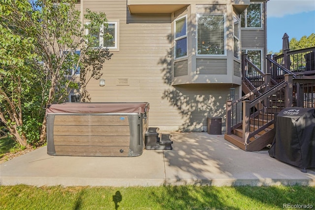 16071 Crestrock Cir, Parker, CO 80134 - view of patio with a hot tub, a grill, and stairway