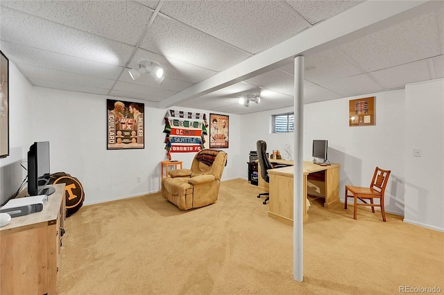 office featuring carpet floors, a drop ceiling, and baseboards