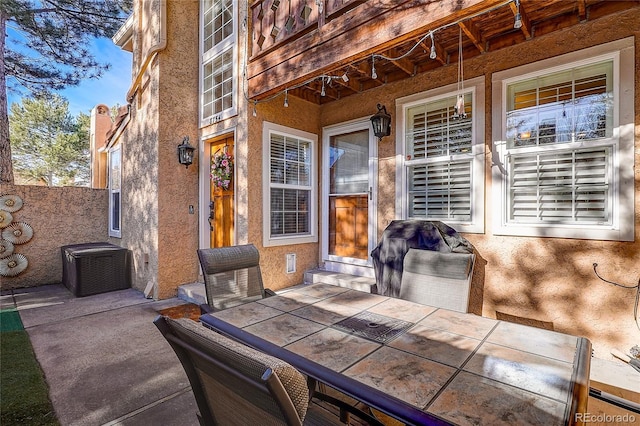 8754 Mesquite Row, Lone Tree, CO 80124 - view of patio / terrace featuring outdoor dining area