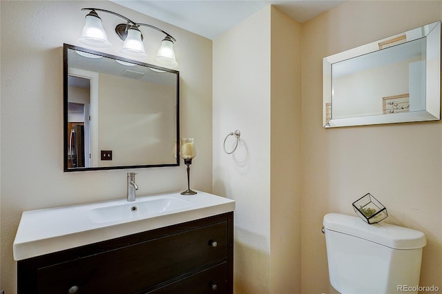 8754 Mesquite Row, Lone Tree, CO 80124 - bathroom with toilet and vanity