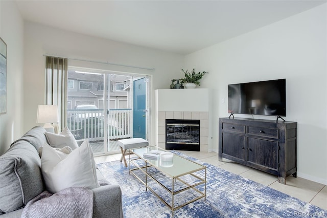 8415 Pebble Creek Way Unit 102, Highlands Ranch, CO 80126 - living area with light tile patterned flooring and a fireplace