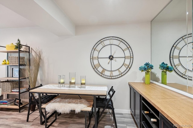 dining area featuring hardwood / wood-style flooring