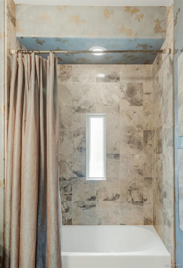 3143 Elmira St, Denver, CO 80238 - full bath featuring shower / bathtub combination with curtain
