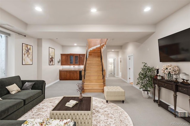 3143 Elmira St, Denver, CO 80238 - living room with light colored carpet, stairs, baseboards, and recessed lighting