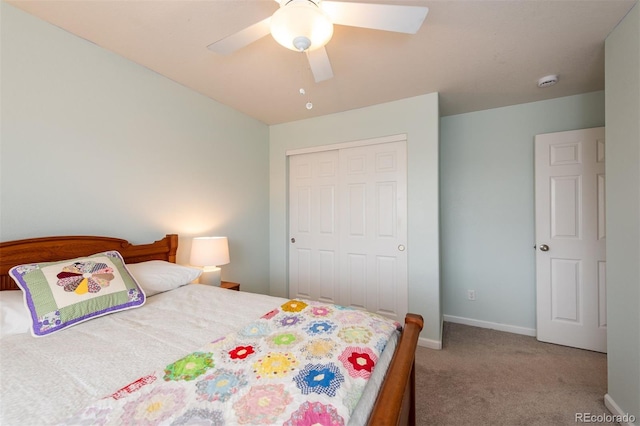 bedroom with ceiling fan, carpet floors, a closet, and baseboards