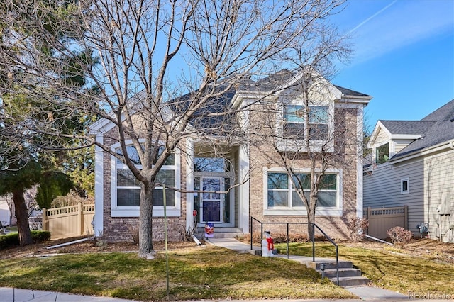 view of front of house with a front lawn