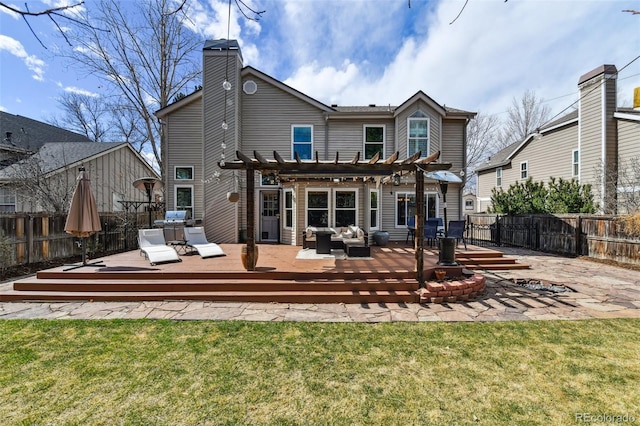 rear view of property with outdoor lounge area, a chimney, a pergola, a fenced backyard, and a wooden deck