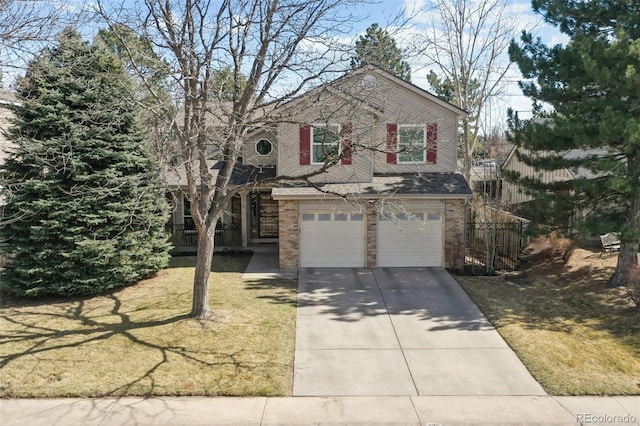 traditional-style house with concrete driveway, an attached garage, brick siding, and a front lawn