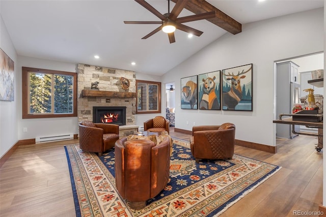 living room with baseboards, wood finished floors, vaulted ceiling with beams, baseboard heating, and a fireplace