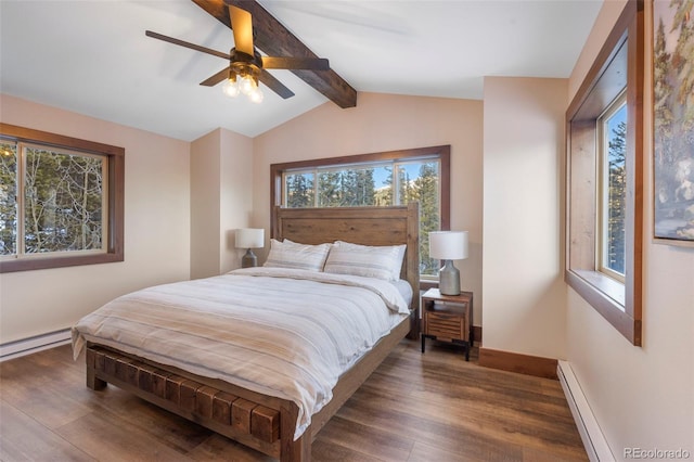 bedroom with a baseboard heating unit, lofted ceiling with beams, wood finished floors, and baseboards