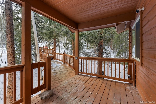 view of snow covered deck