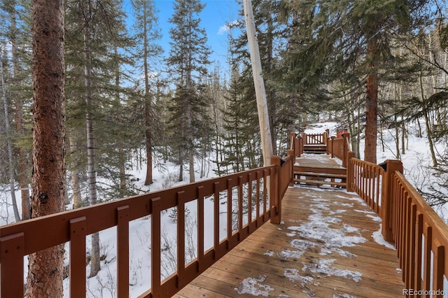 view of snow covered deck