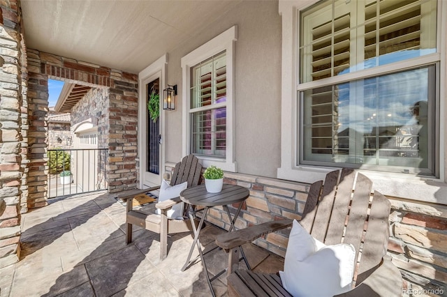 view of patio featuring a porch