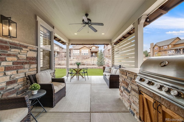 view of patio / terrace featuring outdoor dining area, outdoor lounge area, an outdoor kitchen, a ceiling fan, and a grill