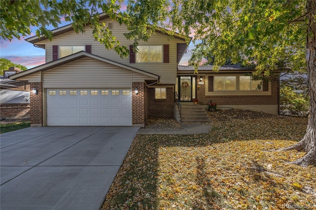 view of front of home with a garage