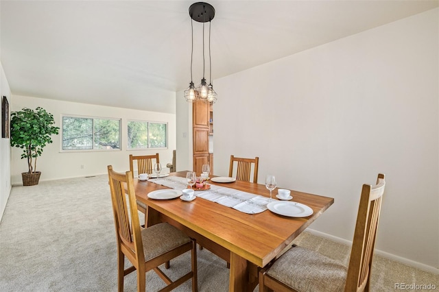 view of carpeted dining space