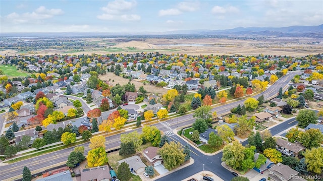 bird's eye view with a mountain view