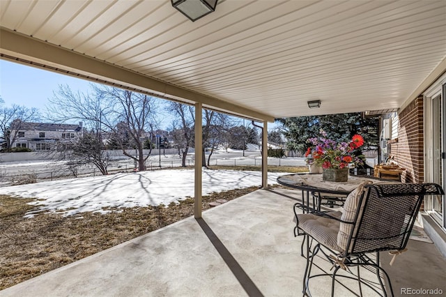 view of snow covered patio