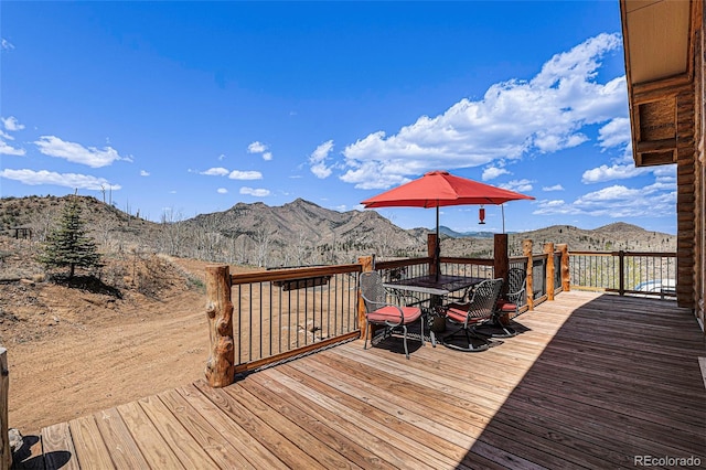 14077 S State Highway 67, Woodland Park, CO 80863 - deck featuring a mountain view and outdoor dining area