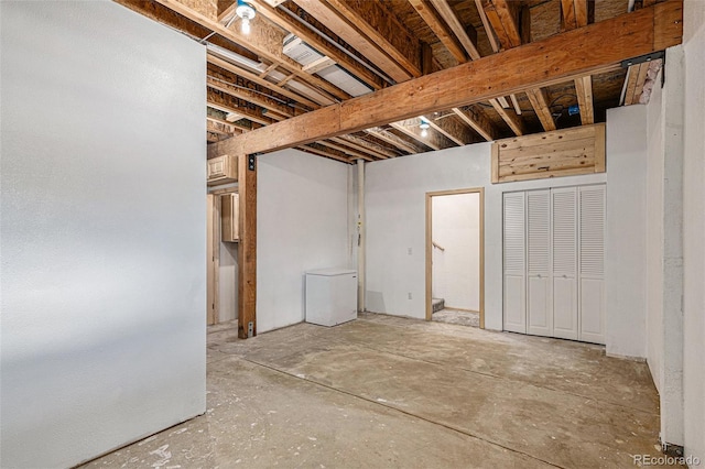 14077 S State Highway 67, Woodland Park, CO 80863 - unfinished basement featuring refrigerator